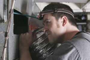 Ventilation Cleaner Man At Work With Tool