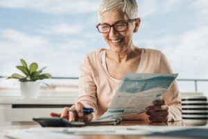 happy woman with low heating bills